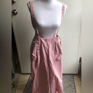 Pink jumper with Buckle straps
